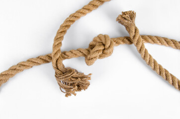 jute rope with knot on white background, thick jute rope,