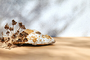 White stone as podiums display before light pastel surface with shadows for product presentation. Pedestal stand. Cosmetics or eco beauty product promotion trendy minimalist mockup.