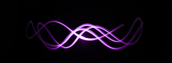 Abstract colorful neon wave gradient with line glowing on dark background. Futuristic creative...