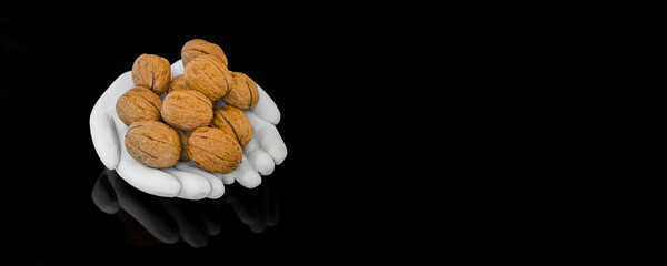 Walnuts Isolated on Black Background with text space 