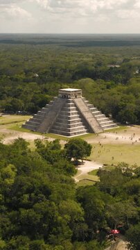 Aerial view of Pyramid of Kukulcan in the Mexican city of Chichen Itza. Vertical video