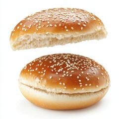 A top and bottom half of a sesame seed burger bun displayed with the top piece floating isolated on a white background