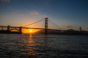 Golden Gate bridge sunset on a sunny day in july , San Francisco , USA