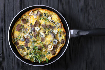 omelette with blue cheese, rye croutons and thyme