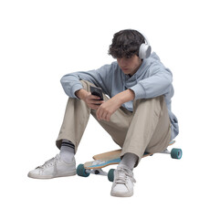 Skater sitting and using a smartphone