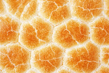 Fototapeta premium Close-up of honeycomb texture with golden hues