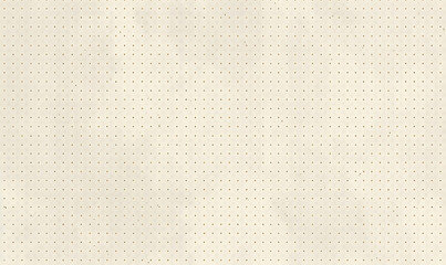 A neutral taupe surface adorned with delicate beige dots, creating a calm and balanced aesthetic