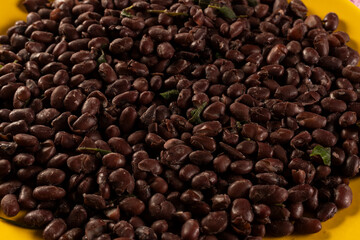 Cooked Black Beans on a plate Pattern texture background
