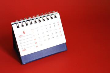 Monthly calendar template for the new year 2025 desk calendar,on red background