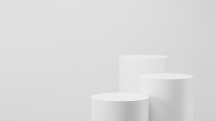 A minimalist product display with cylindrical podiums of varying heights and colors. For product presentation. 3D rendering.