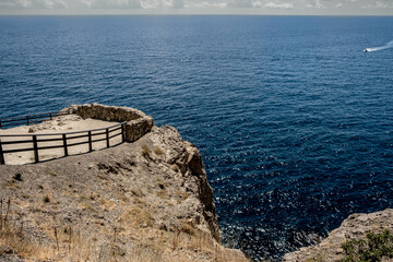 An observation deck on the seashore on a summer day.