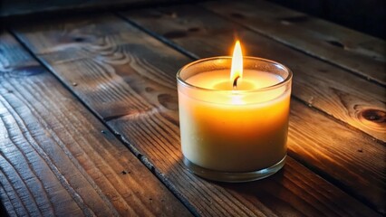 A Single Candle Flame Illuminates a Rustic Wooden Tabletop