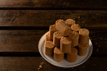 Sweet Brazilian Peanut Called Paçoca on a wooden desk
