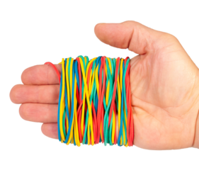 Colorful elastic bands held in a hand, showcasing various shades and lengths suitable for organizing and crafting activities