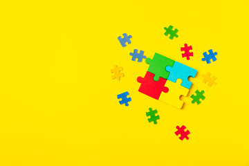 Autism puzzle.Autism awareness day. Colorful bright puzzles.Puzzle. 2 April world autism awareness day background. Top view. Space for text.Copy space.Design element.Care Awareness campaign for Autism