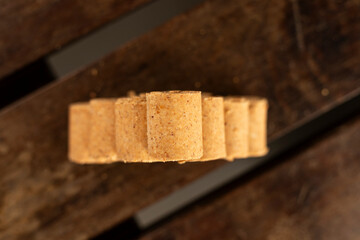 Sweet Brazilian Peanut Called Paçoca on a wooden desk