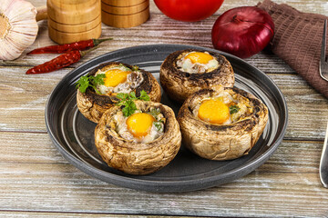 Baked champignon with quail egg