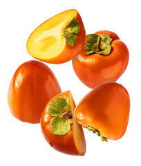 Fresh ripe Persimone fruit falling in the air isolated on white background, food levitation or zero gravity conception