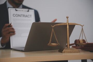 Law theme, gavel or mallet of the judge, lawyer enforcement officers, evidence-based cases taken into account in the court abount business, legislation.