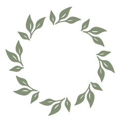 A wreath made of green leaves arranged in a circular pattern