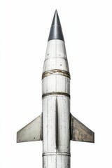 Weathered missile, pointed nose, metallic body.