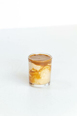 mousse of dulce de leche in a glass recepient