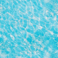 Obraz premium Clear turquoise water reflects sunlight, creating soothing patterns and textures in a tranquil setting beneath the bright blue sky