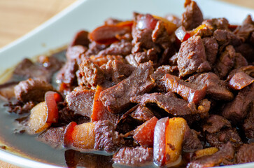 Delicious pork cooked in soy sauce with customizable space for text. Asian food concept