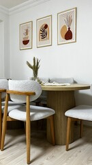 wooden dining table and paintings on it