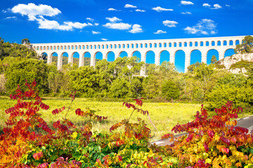 Obraz premium Roquefavour stone Aqueduct in green landscape scenic view