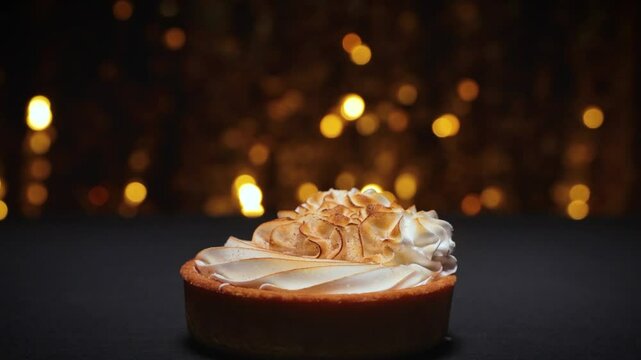 Delicious confectionery with cream filling on a dark background. Shortbread tartlets with protein cream.