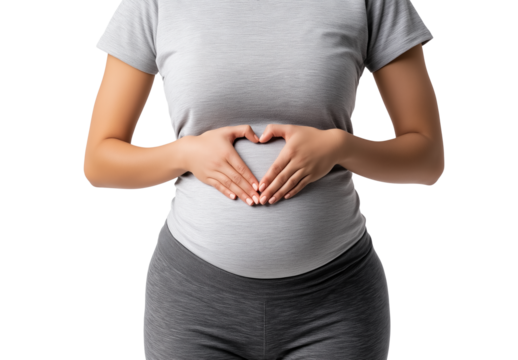 Close-up of a woman’s hands making a heart gesture on her belly isolated on transparent background, representing health or pregnancy