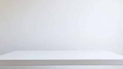 Minimalist White Table with Smooth Surface Against Plain White Wall for Stylish Interior Design and Modern Aesthetic in Contemporary Spaces