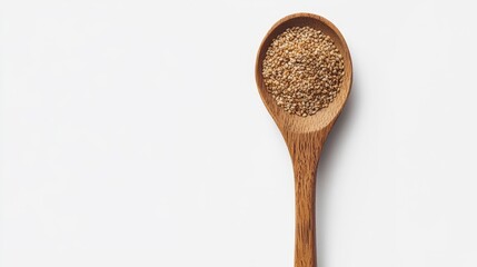 A wooden spoon with a small amount of sesame seeds on it
