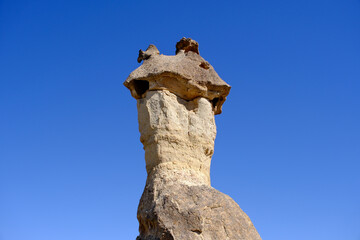 Fairy chimneys hoodoo rock close up, in Cappadocia, Turkey