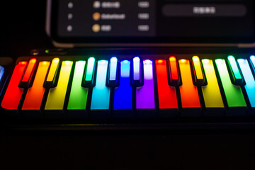 a keyboard with many colored keys that say rainbows.