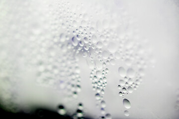 Water Condensation Small Bubbles Moisture on a Glass Window Close up