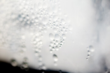 Fototapeta premium Water Condensation Small Bubbles Moisture on a Glass Window Close up