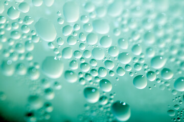 Water Condensation Small Bubbles Moisture on a Glass Green Window Close up