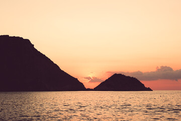 Sunset Over Serene Ocean Hills