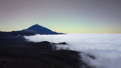 Volcano on the top of clouds 