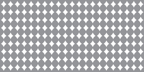 Seamless diamond harlequin geometric background pattern. Tileable black and white circus clown vintage wallpaper texture. Monochrome greyscale rhombus tile mosaic or diagonal checker backdrop