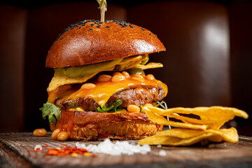 tasty burger with nachos closeup