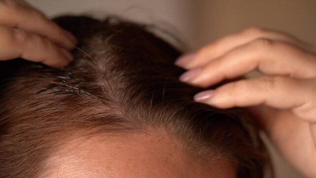 Pre-wash scalp and hair oiling. Scalp massaging with hands. Pre-shampoo treatment. Hair loss