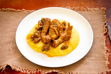 Traditional and rustic Brazilian dish, free-range chicken with polenta. Real food
