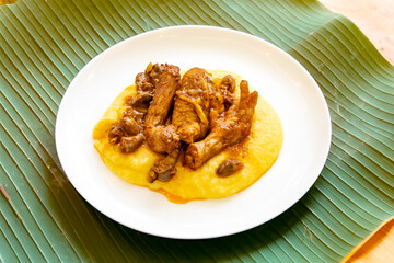 Traditional and rustic Brazilian dish, free-range chicken with polenta. Real food