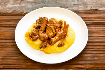 Traditional and rustic Brazilian dish, free-range chicken with polenta. Real food