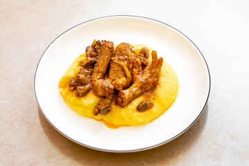Traditional and rustic Brazilian dish, free-range chicken with polenta. Real food