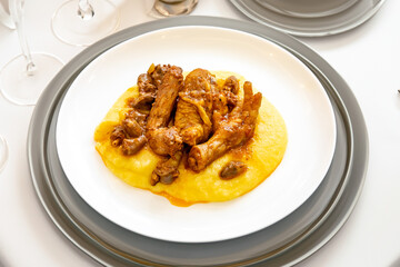 Traditional and rustic Brazilian dish, free-range chicken with polenta. Real food