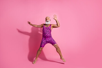 Full body photo of positive old man have fun excited dance wear glamour leopard print overall...